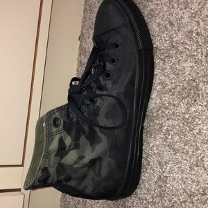 Black and green water resistant converse